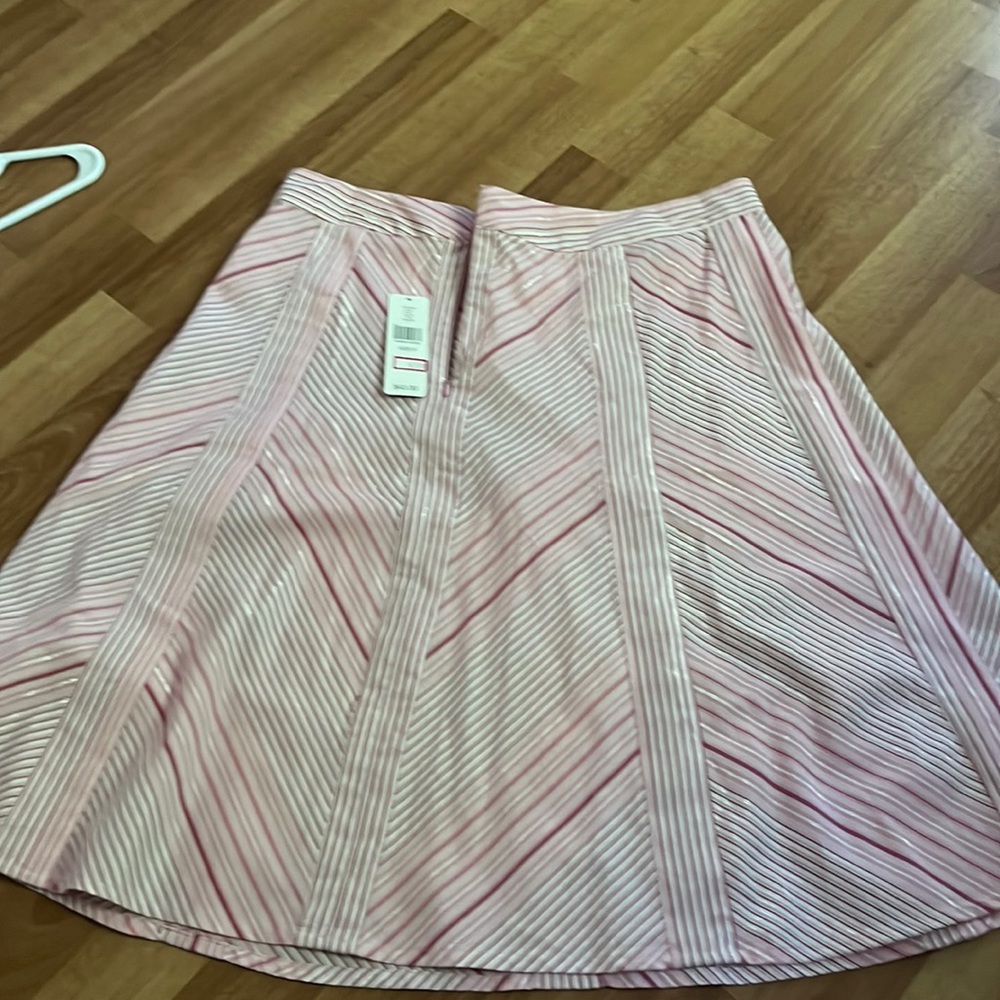 Knee length pink striped skirt